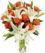 Vase of Orange Roses and White Oriental Lilies Vase of Orange Roses and White Oriental Lilies